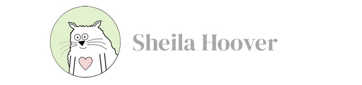 wordmark of Sheila Hoover with a cartoon cat smiling with a heart on its chest